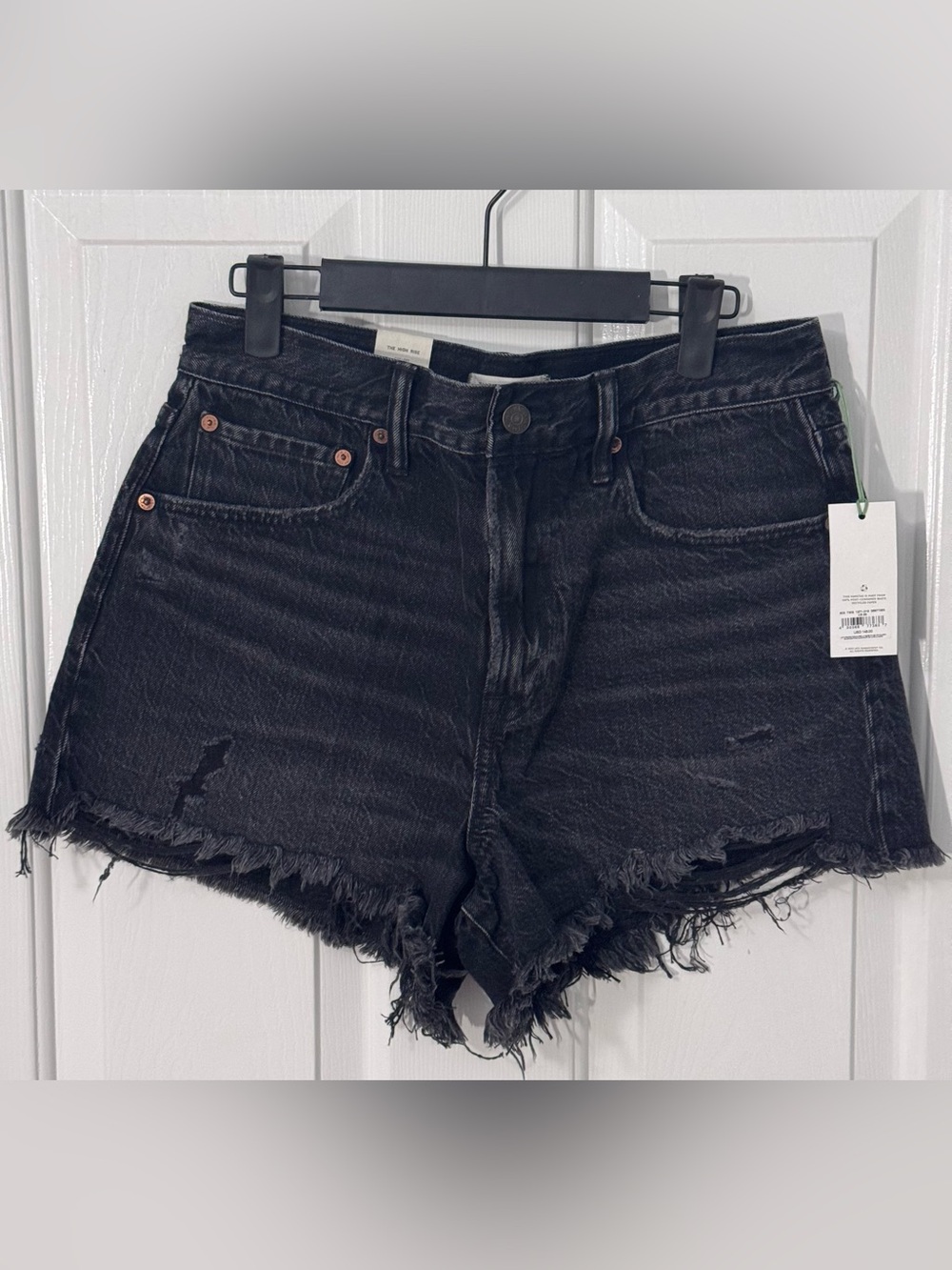 Brand new with tags AE77 The High Rise Cut-Off denim shorts in size 28.